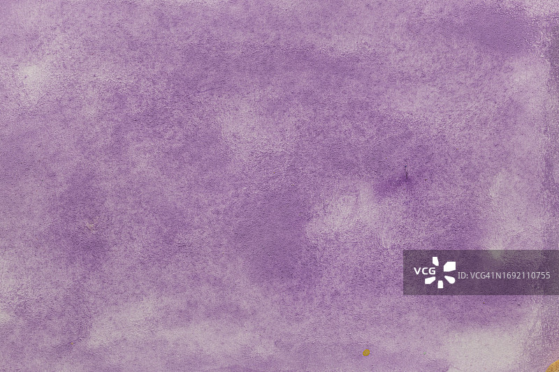 一个抽象的彩色水彩渐变填充背景与水彩污渍的特写。图片素材